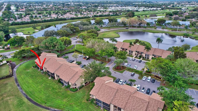 drone / aerial view featuring a water view