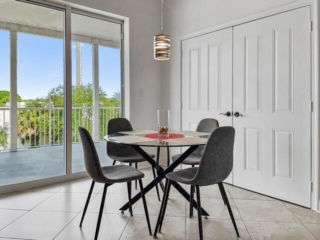 dining room featuring light tile patterned floors