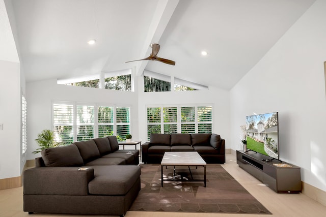 living room featuring ceiling fan, beamed ceiling, and high vaulted ceiling