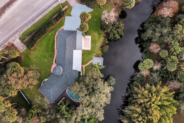 drone / aerial view with a water view