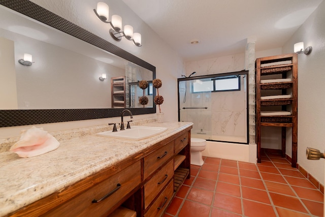 bathroom with tile patterned flooring, an enclosed shower, toilet, and vanity