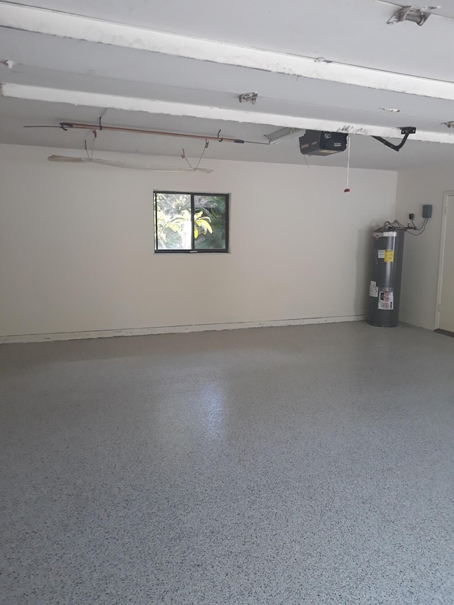 garage featuring a garage door opener and water heater