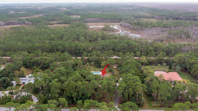 bird's eye view featuring a view of trees