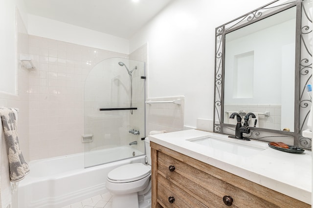 full bathroom featuring tile patterned flooring, vanity, toilet, and shower / bathing tub combination