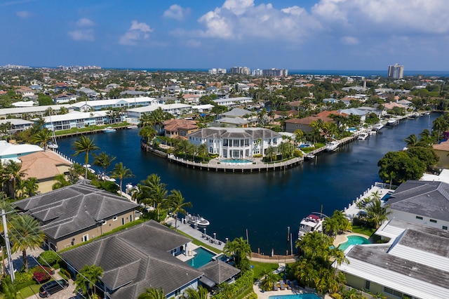 bird's eye view with a water view