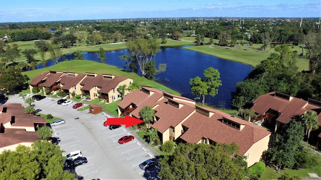 birds eye view of property featuring a water view