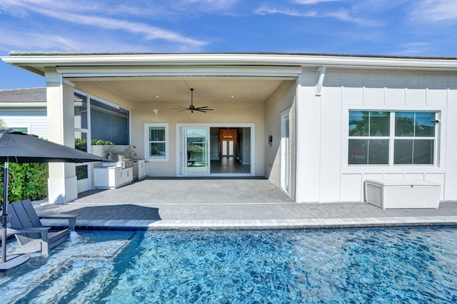 rear view of property featuring a patio, area for grilling, and ceiling fan