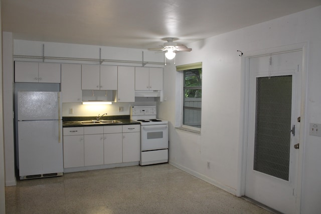 kitchen featuring white appliances, white cabinetry, sink, and ceiling fan