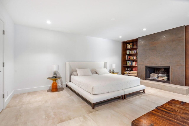 bedroom featuring a fireplace