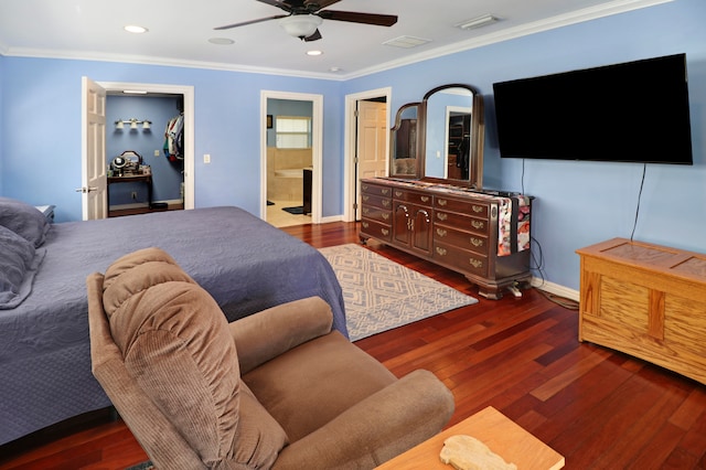 bedroom featuring ornamental molding, ceiling fan, connected bathroom, and dark hardwood / wood-style flooring