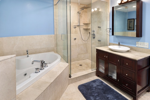 bathroom with vanity, plus walk in shower, and tile patterned flooring