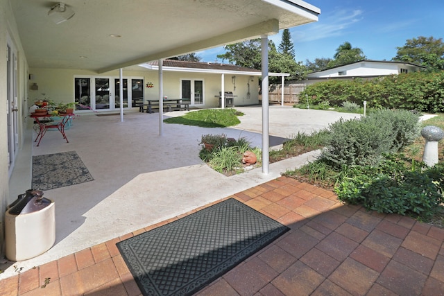 view of patio / terrace featuring french doors and area for grilling