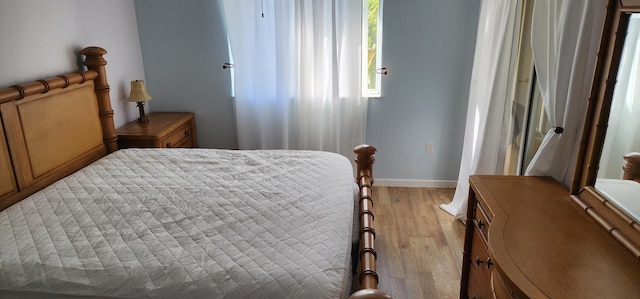 bedroom featuring light hardwood / wood-style floors