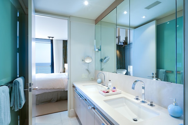 bathroom with vanity and tile patterned floors