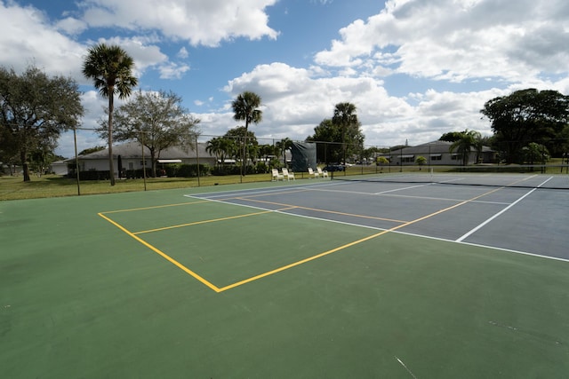 view of sport court featuring basketball hoop