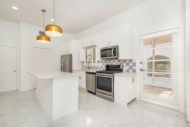 kitchen with visible vents, stainless steel appliances, marble finish floor, and white cabinetry