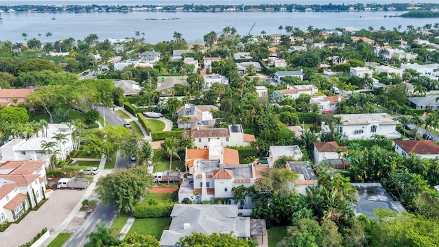 bird's eye view with a residential view and a water view