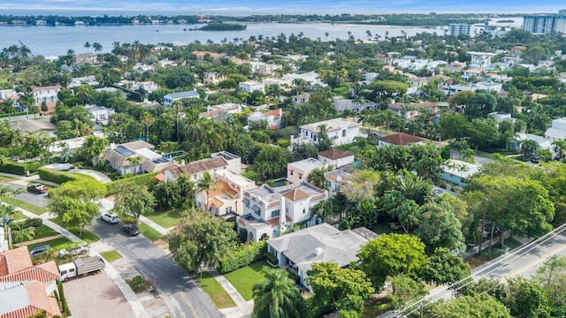 birds eye view of property featuring a residential view and a water view