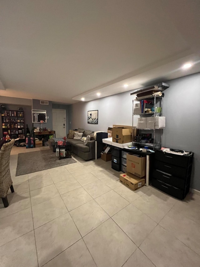 living room featuring light tile patterned floors