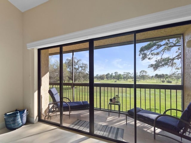 doorway to outside featuring tile patterned floors