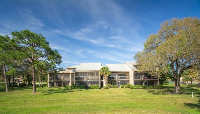 view of community featuring a lawn