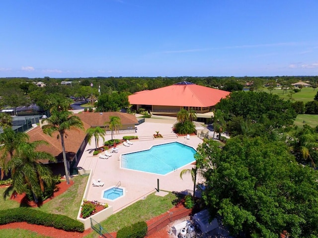 view of swimming pool featuring a patio area