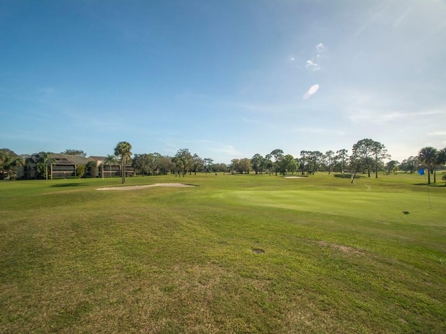 view of home's community featuring a yard