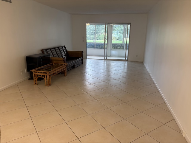 living area featuring light tile patterned flooring