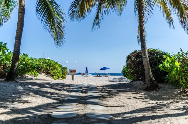 property view of water featuring a view of the beach