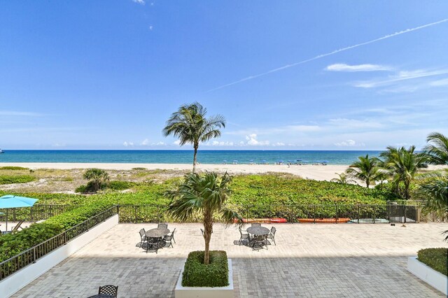 2800 S Ocean Blvd Unit 2-A, Boca Raton, FL 33432 - view of water feature featuring a view of the beach and fence