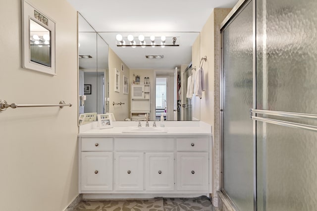 2800 S Ocean Blvd Unit 2-A, Boca Raton, FL 33432 - full bath with baseboards, a shower stall, and vanity