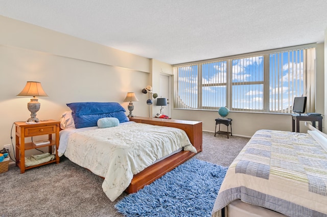 2800 S Ocean Blvd Unit 2-A, Boca Raton, FL 33432 - carpeted bedroom with a textured ceiling