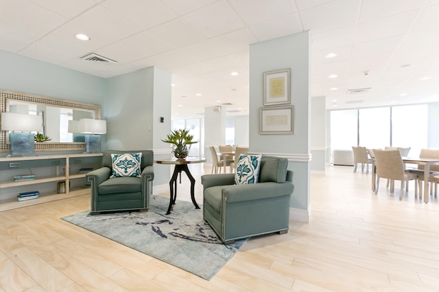 2800 S Ocean Blvd Unit 2-A, Boca Raton, FL 33432 - living area with baseboards, visible vents, a wealth of natural light, and wood finished floors