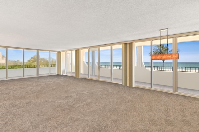 2800 S Ocean Blvd Unit 2-A, Boca Raton, FL 33432 - interior space featuring a water view, carpet, and a wealth of natural light