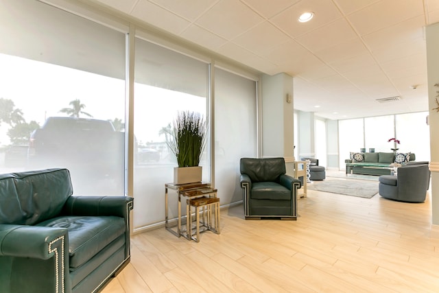 2800 S Ocean Blvd Unit 2-A, Boca Raton, FL 33432 - sitting room featuring light wood-style floors and visible vents