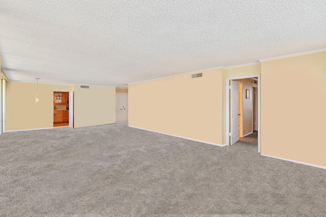 2800 S Ocean Blvd Unit 2-A, Boca Raton, FL 33432 - carpeted empty room with a textured ceiling, visible vents, ornamental molding, and baseboards