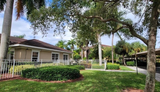 view of community featuring a lawn