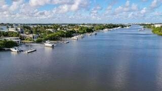 property view of water featuring a boat dock