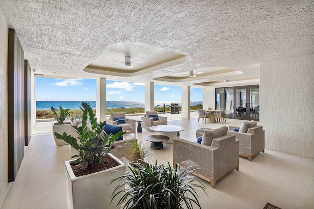 building lobby featuring a water view