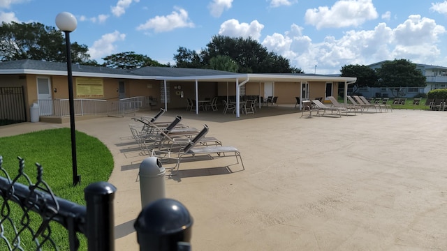 rear view of house with a patio