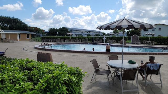 view of swimming pool featuring a patio