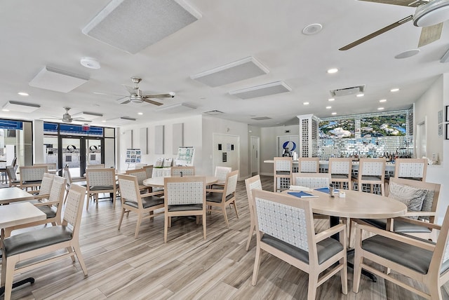 dining space featuring ceiling fan