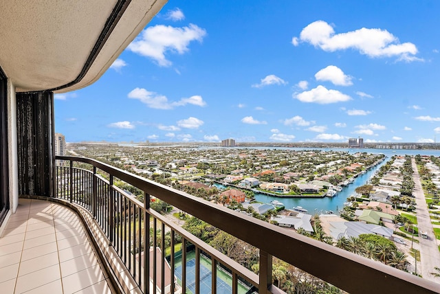 balcony featuring a water view