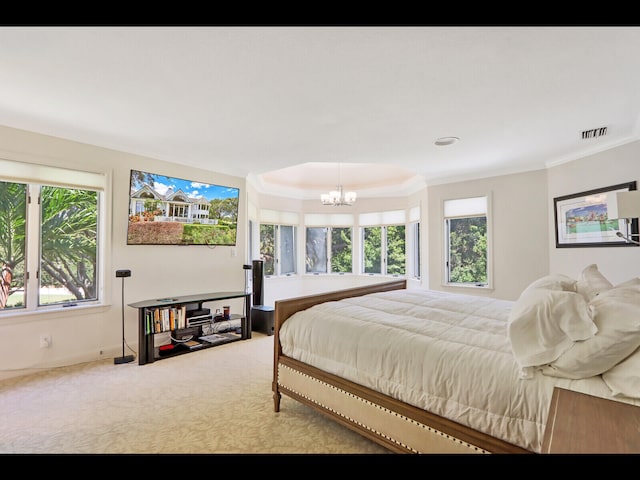 bedroom with ornamental molding, an inviting chandelier, and carpet