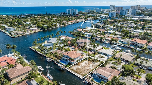 drone / aerial view featuring a water view