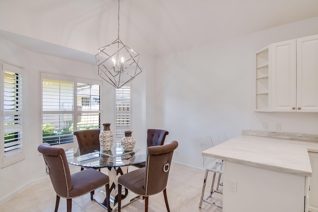 dining area featuring a chandelier