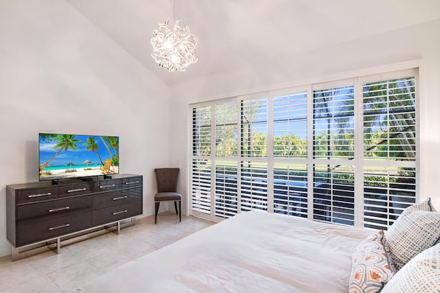 tiled bedroom featuring lofted ceiling and a notable chandelier