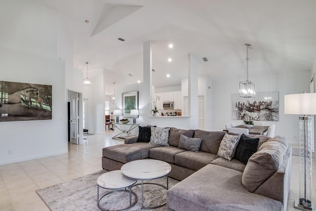 2156 Wightman Dr, Wellington, FL 33414 - living room featuring a notable chandelier, baseboards, light tile patterned floors, visible vents, and high vaulted ceiling