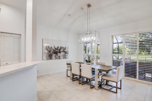 tiled dining space with an inviting chandelier