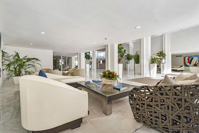 living room featuring expansive windows